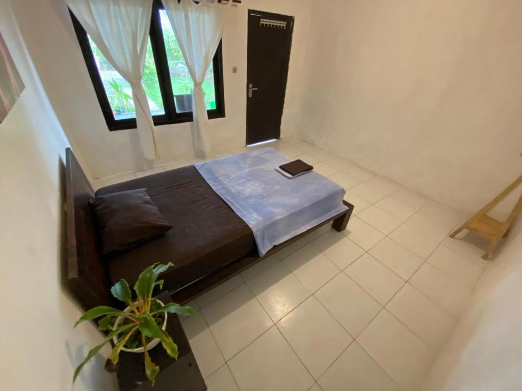 Sumbul surf lodge Jembrana Cameră foto